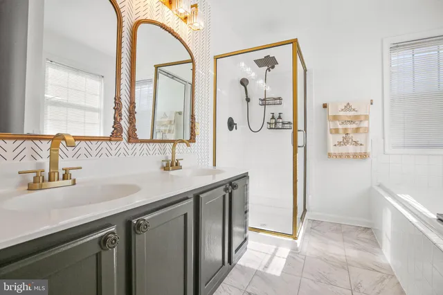 a white bath tub sitting next to a window