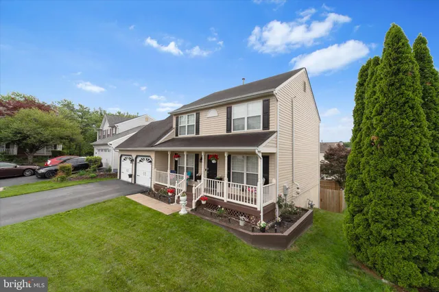 a view of a patio with table and chairs and wooden floor