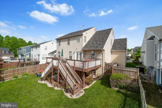an aerial view of a house with a garden