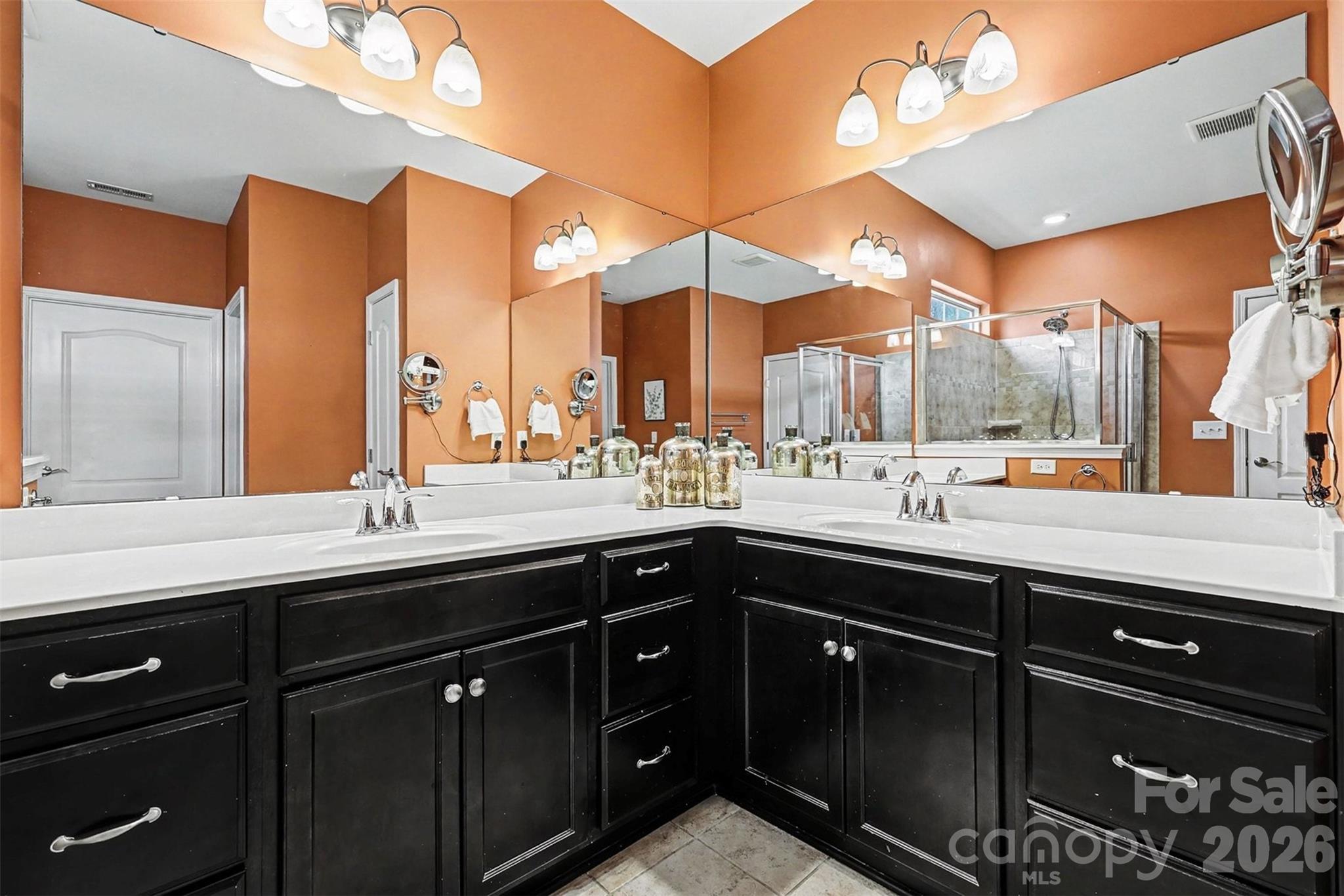 2192 Winhall Road Fort Mill, SC 29715 - Photo 18 of 32 a bathroom with a sink double vanity and a mirror