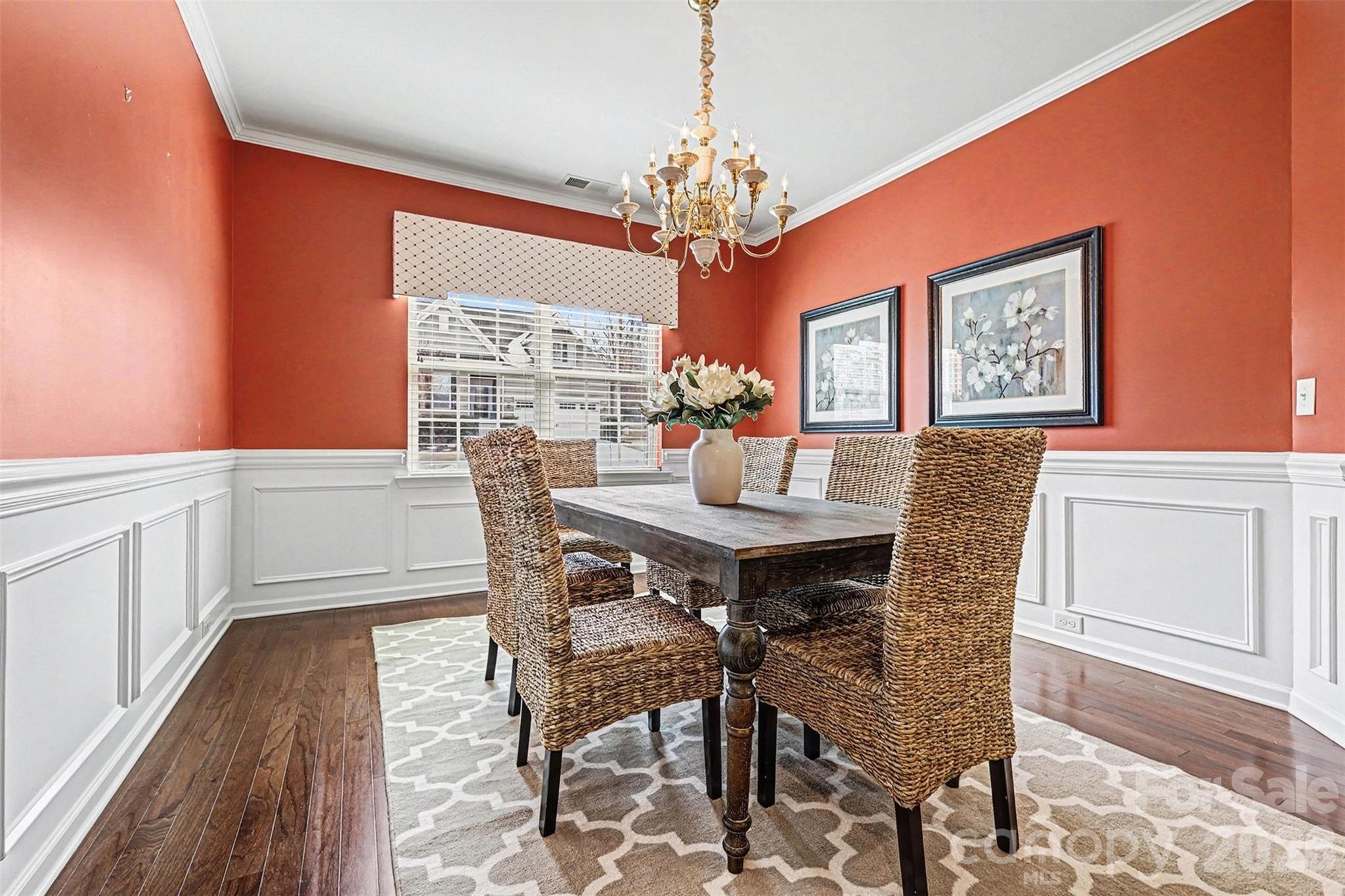2192 Winhall Road Fort Mill, SC 29715 - Photo 4 of 32 a view of a dining room with furniture window and wooden floor