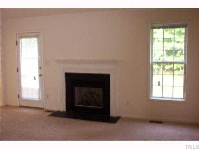6032 Burgundy Road Durham, NC 27712 - Photo 5 of 7 Family Room with Gas Log Fireplace.