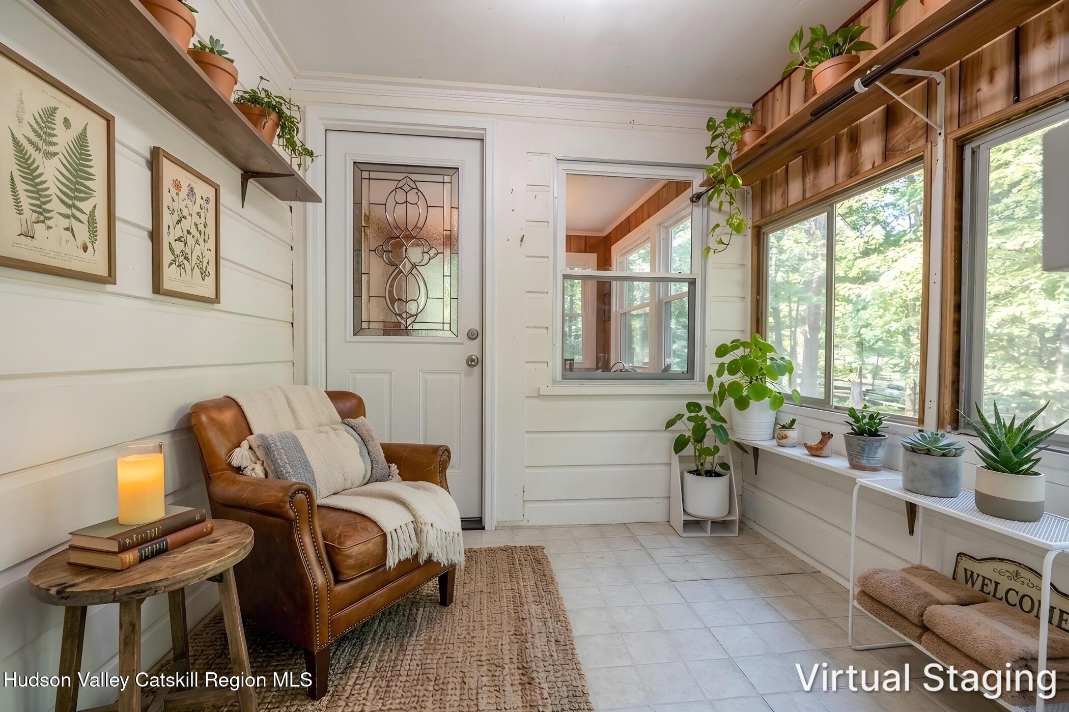 4533 Atwood Road Stone Ridge, NY 12484 - Photo 25 of 63 a living room with furniture and a large window