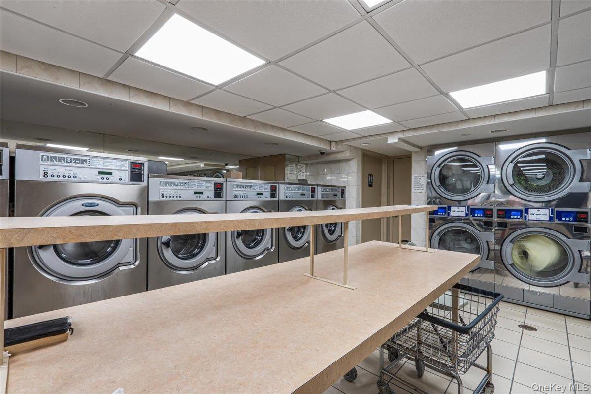 59-30 108th Street, Unit 6D Queens, NY 11368 - Photo 23 of 23 a utility room with dryer and washer