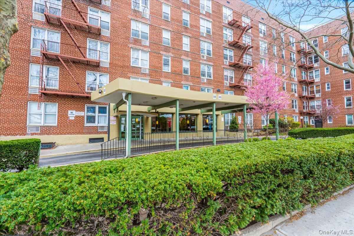 59-30 108th Street, Unit 6D Queens, NY 11368 - Photo 3 of 23 a view of a building with a big yard
