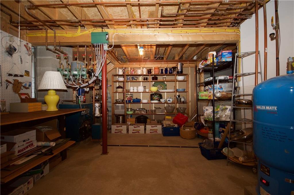 2417 Sennebec Road Appleton, ME 04862 - Photo 16 of 29 Basement utility and storage area.