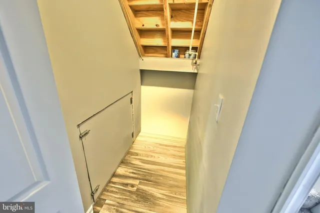 a view of a sign board with a yard