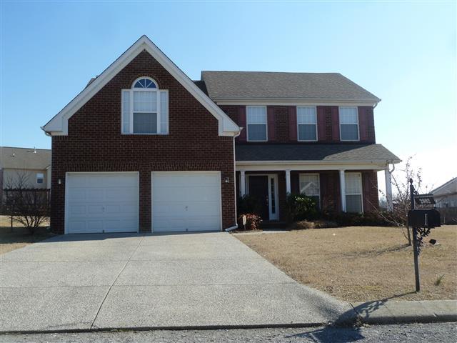 2002 Silverton Circle Spring Hill, TN 37174 - Photo 1 of 17 a front view of a house with a yard