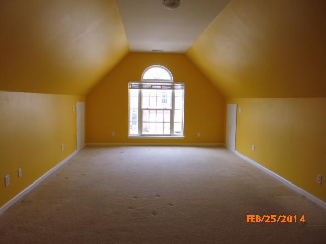 2002 Silverton Circle Spring Hill, TN 37174 - Photo 17 of 17 an empty room with windows and ceiling fan