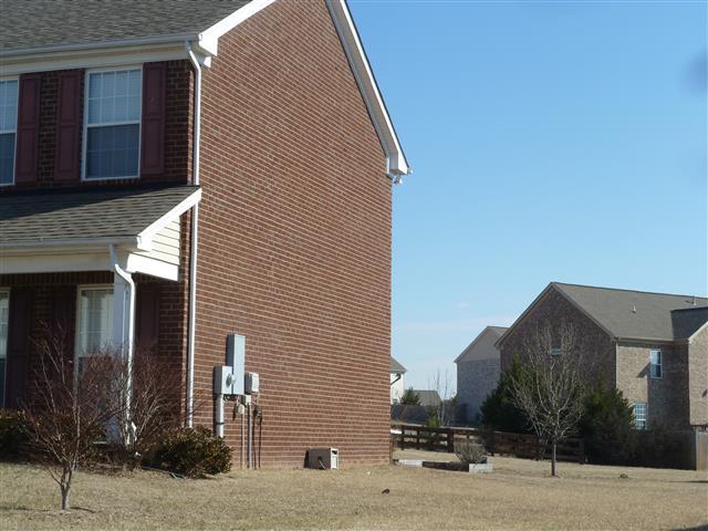 2002 Silverton Circle Spring Hill, TN 37174 - Photo 3 of 17 a view of a house with a backyard