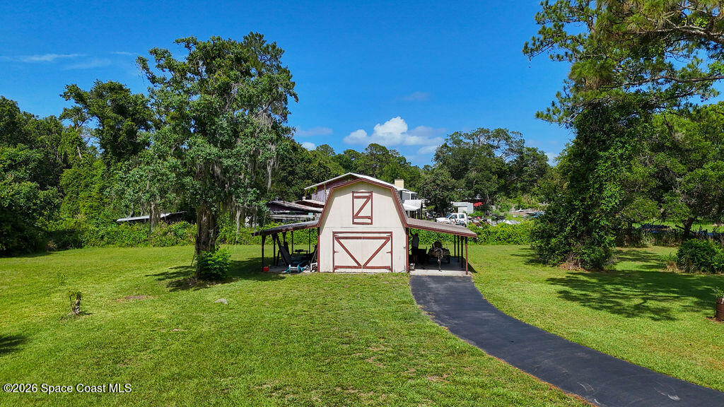 4028 McCullough Road Mims, FL 32754 - Photo 4 of 37 IMG_1366