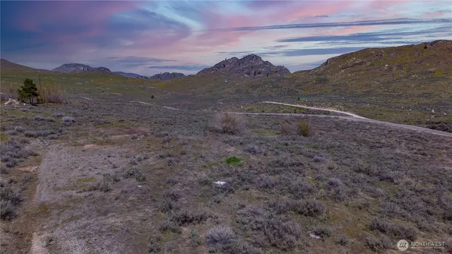 a view of mountain with sunset view