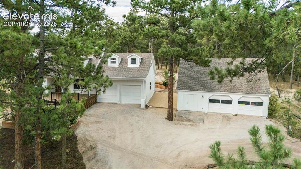 11665 Greentree Road Colorado Springs, CO 80908 - Photo 38 of 43 Garage featuring a garage
