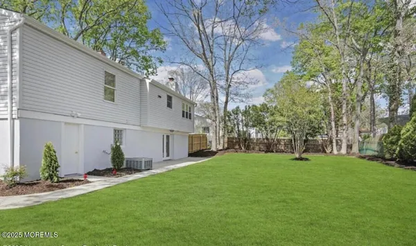 a view of a backyard with a garden