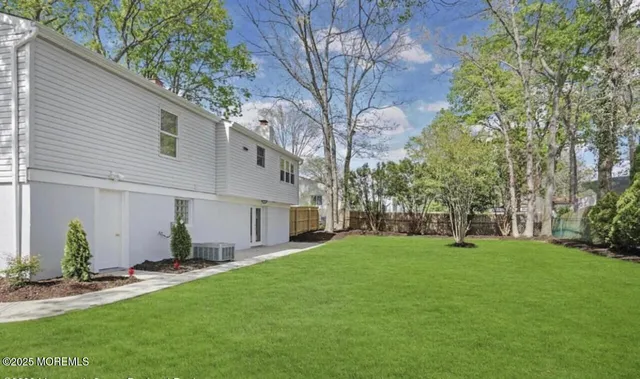 a view of a backyard with a garden