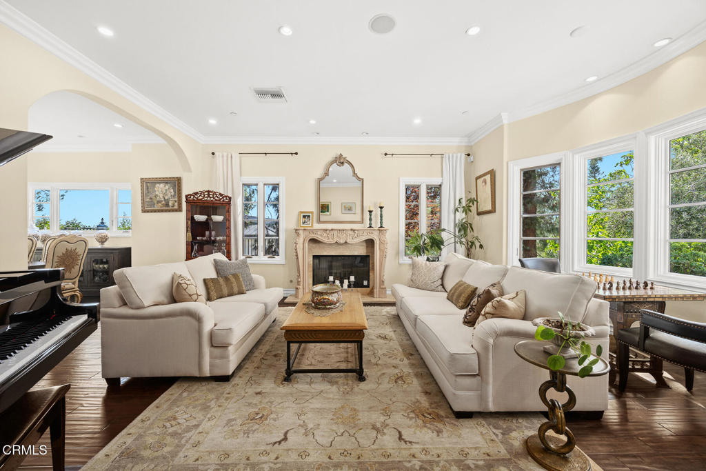 574 Camillo Road Sierra Madre, CA 91024 - Photo 11 of 72 a living room with furniture fireplace and a large window