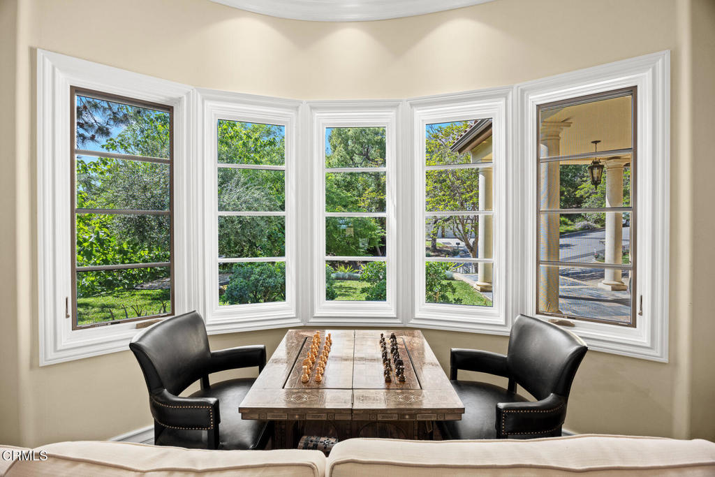 574 Camillo Road Sierra Madre, CA 91024 - Photo 13 of 72 a living room with furniture and large windows