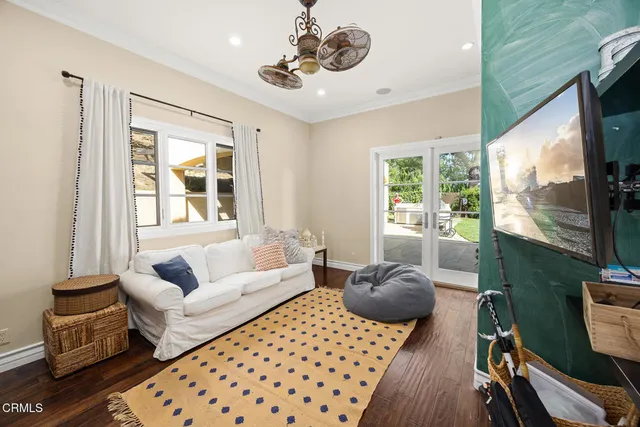 a spacious bedroom with a large bed and a large window