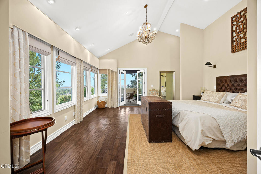 574 Camillo Road Sierra Madre, CA 91024 - Photo 36 of 72 a spacious bedroom with a large bed and a large window