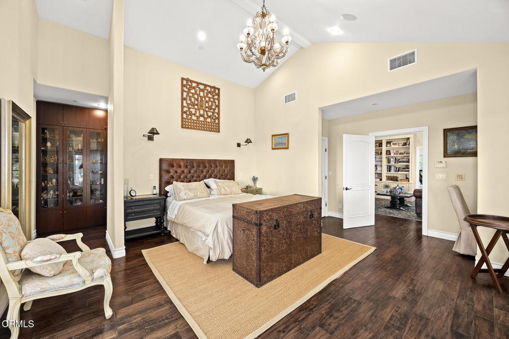 574 Camillo Road Sierra Madre, CA 91024 - Photo 38 of 72 a spacious bedroom with a bed and wooden floor