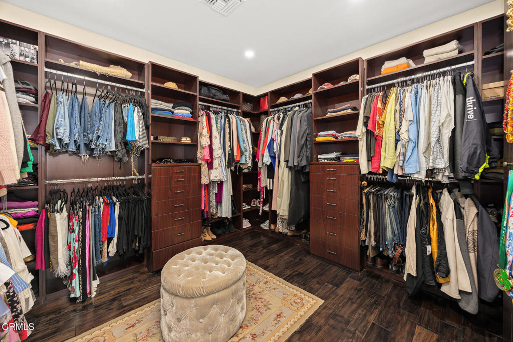 574 Camillo Road Sierra Madre, CA 91024 - Photo 39 of 72 a view of walk in closet with clothes and shoes