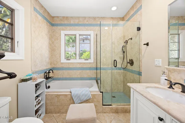 a view of a swimming pool with sitting area