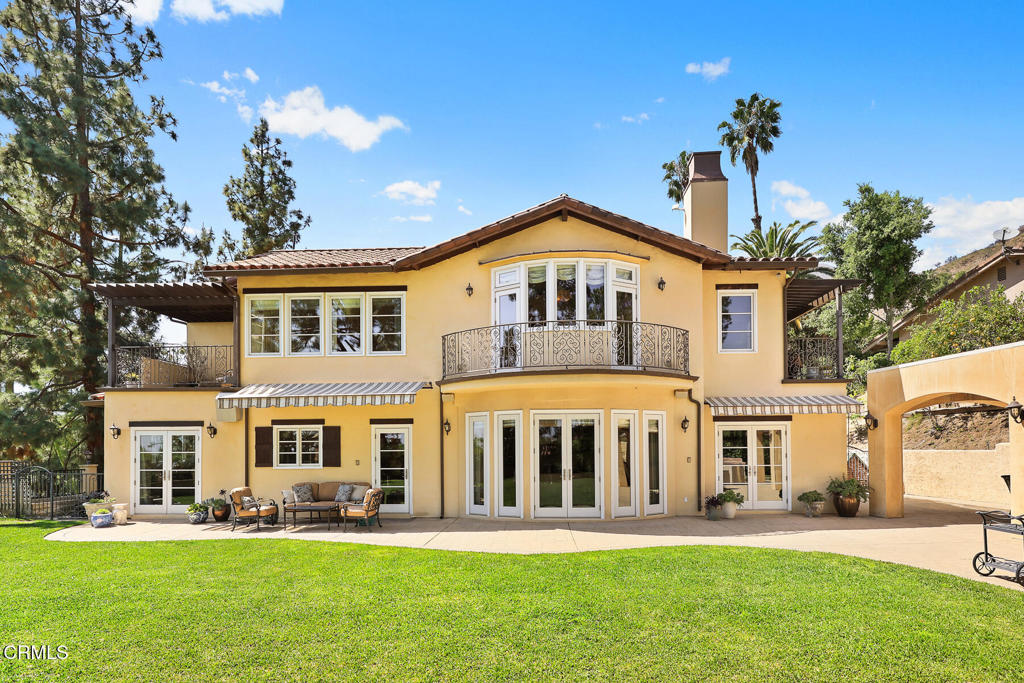 574 Camillo Road Sierra Madre, CA 91024 - Photo 52 of 72 a front view of a house with a yard table and chairs