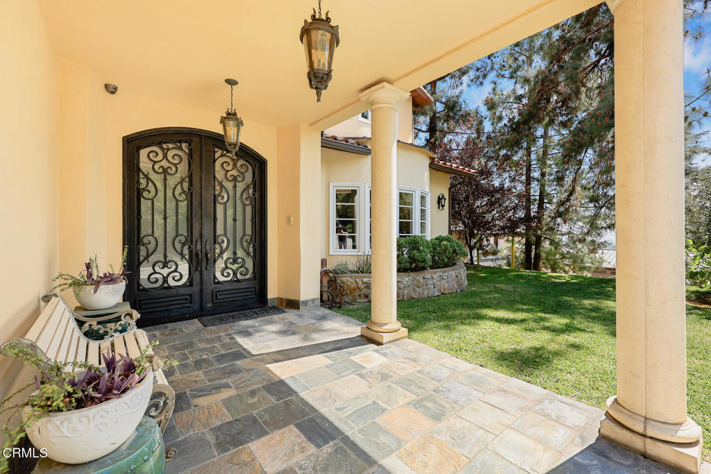 574 Camillo Road Sierra Madre, CA 91024 - Photo 6 of 72 a front view of a house with garden