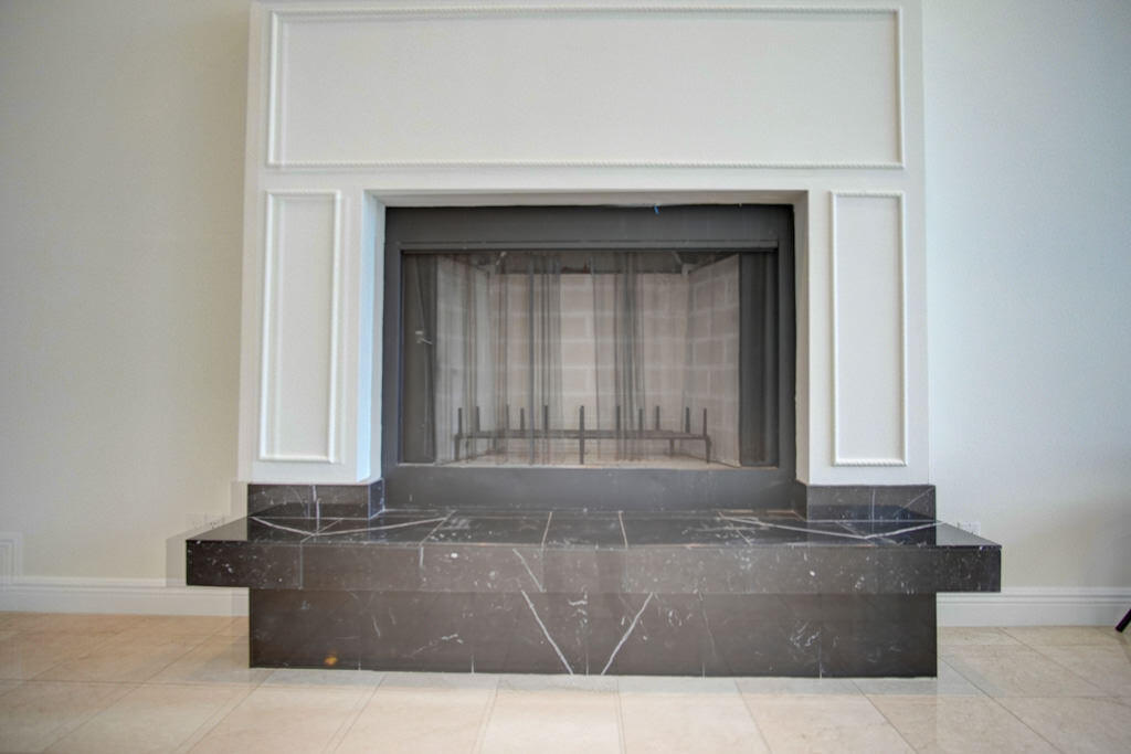 1823 Southwest 17th Street Boca Raton, FL 33486 - Photo 18 of 67 a living room with a couch and a window