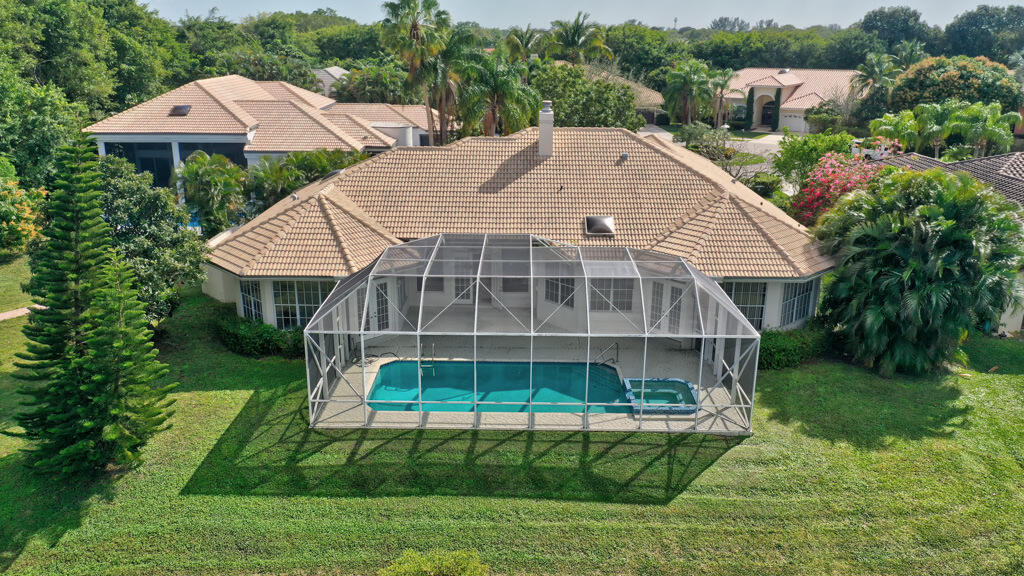 1823 Southwest 17th Street Boca Raton, FL 33486 - Photo 9 of 67 a aerial view of a house with a yard and potted plants