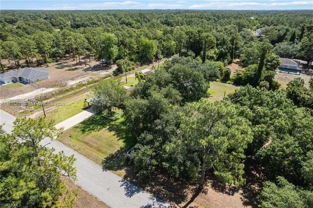 an aerial view of residential house with outdoor space