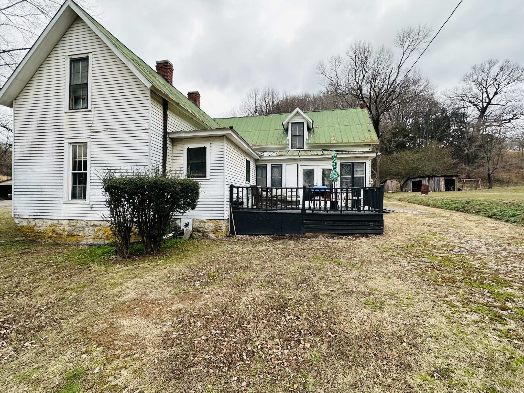 247 Hamestring Road Fayetteville, TN 37334 - Photo 14 of 29 a view of a house with backyard and sitting area