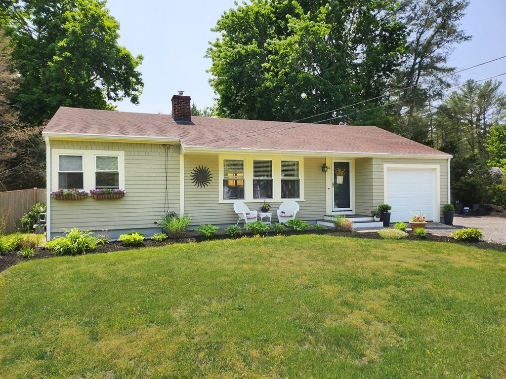 112 Marion Road Rochester, MA 02770 - Photo 1 of 18 a view of a house with a yard