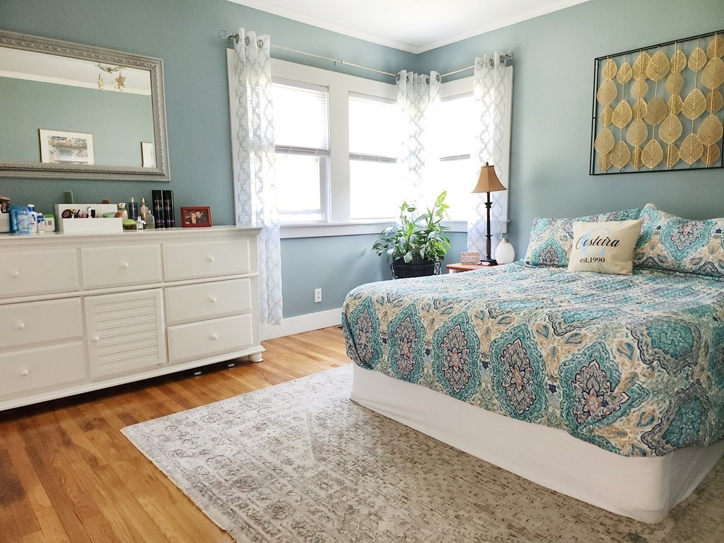 112 Marion Road Rochester, MA 02770 - Photo 12 of 18 a bed room with a bed and a window