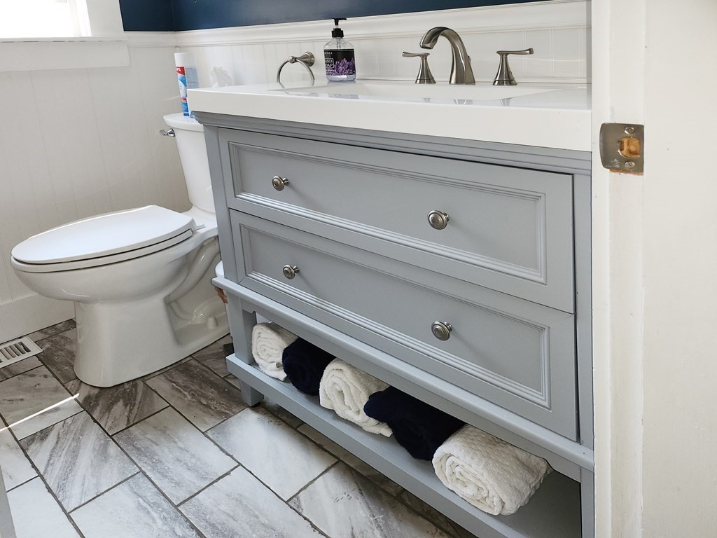 112 Marion Road Rochester, MA 02770 - Photo 15 of 18 a bathroom with a toilet and a sink