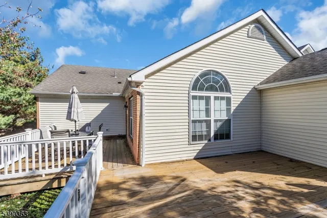 a view of a house with a small yard