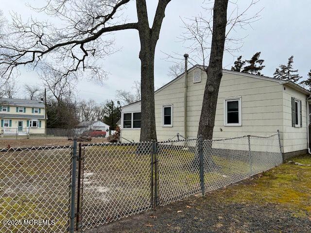 4 Cedar Avenue Waretown, NJ 08758 - Photo 15 of 15 a view of a house with a tree in the background