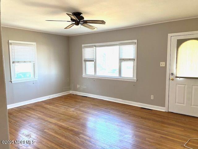 4 Cedar Avenue Waretown, NJ 08758 - Photo 3 of 15 an empty room with wooden floor and windows