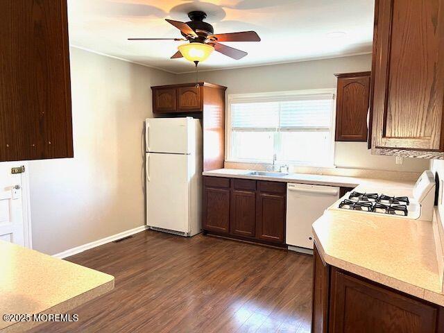 4 Cedar Avenue Waretown, NJ 08758 - Photo 8 of 15 a kitchen with a sink a stove a refrigerator and a window