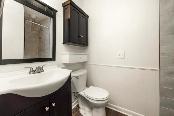 a bathroom with a sink and a toilet