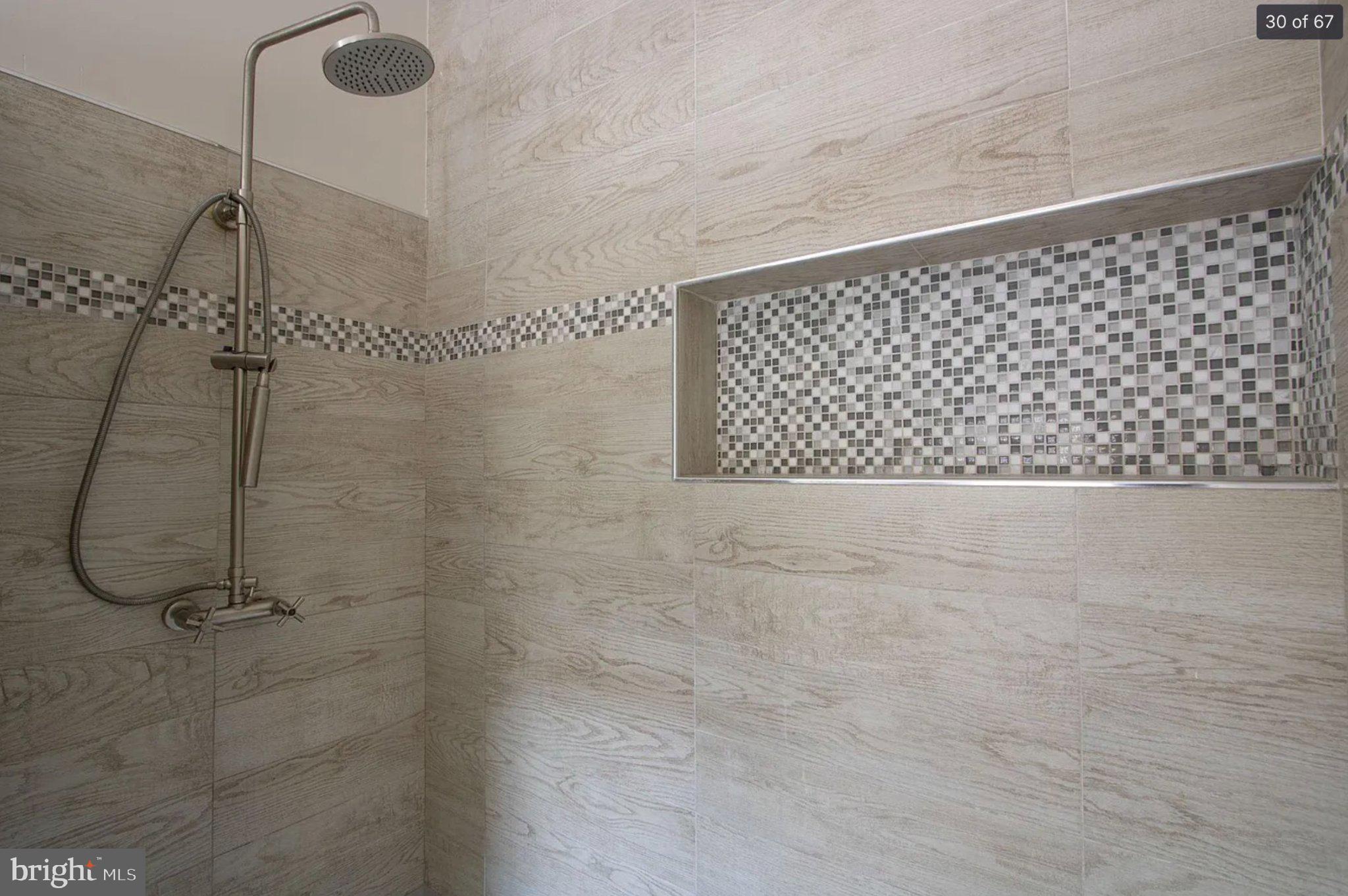 3906 Valley Ridge Drive Fairfax, VA 22033 - Photo 31 of 58 Sleek modern shower with mosaic accents.