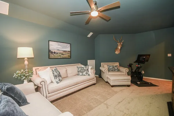 a living room with furniture and a couch