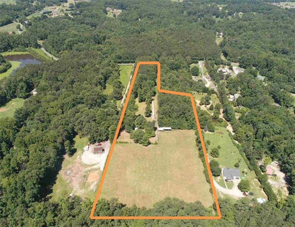 3553 Aaron Sosebee Road Cumming, GA 30028 - Photo 1 of 1 a view of a yard