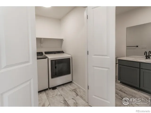 a kitchen with a stove and a microwave