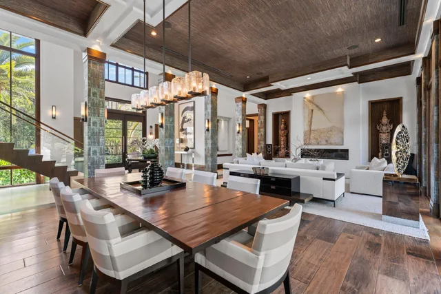 a kitchen with stainless steel appliances granite countertop a sink and a refrigerator