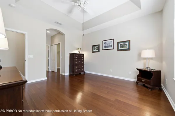 a view of livingroom with hardwood floor and a ceiling fan