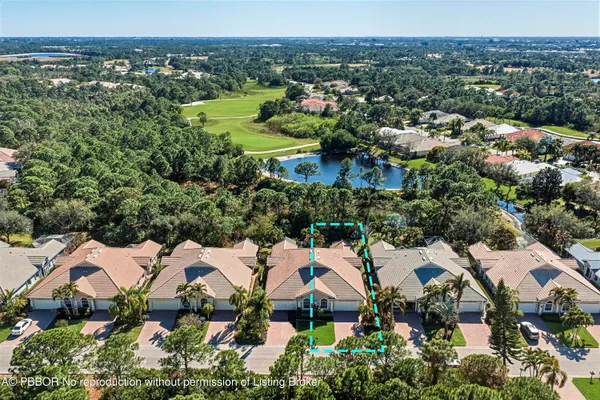 an aerial view of residential house with outdoor space