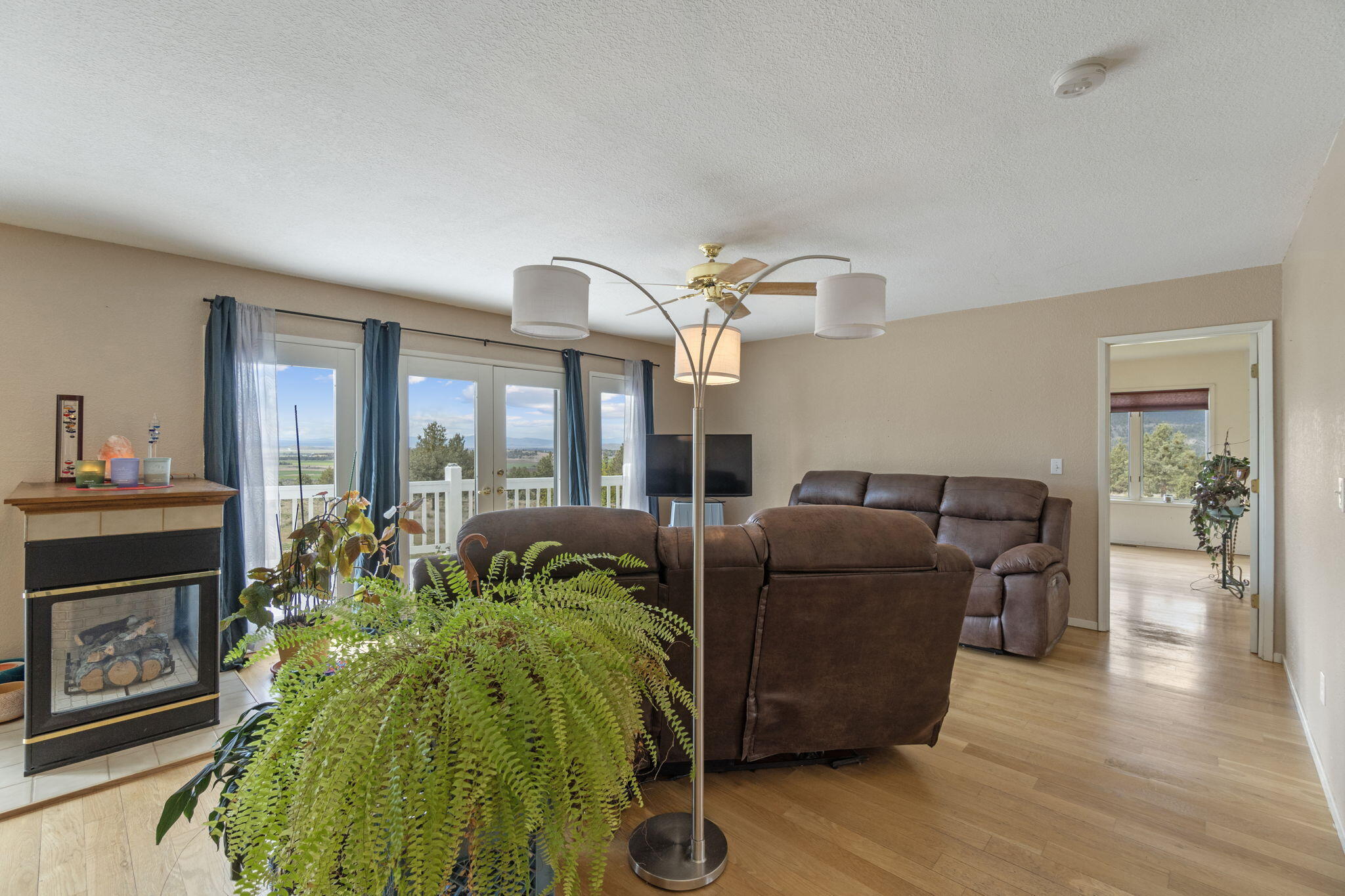 17722 Pope Road Merrill, OR 97633 - Photo 23 of 61 a living room with furniture and a fireplace