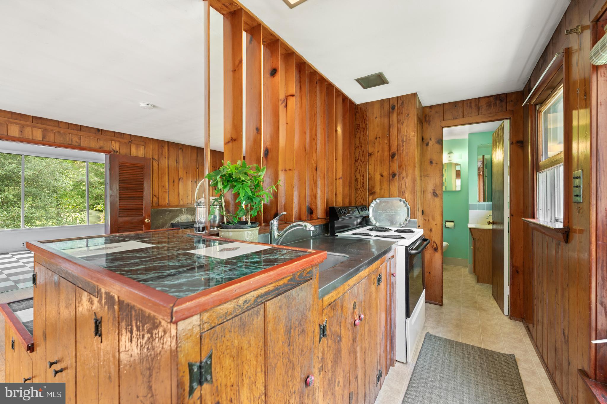 120 Diamond Rock Road Phoenixville, PA 19460 - Photo 56 of 86 a kitchen that has a stove and a table