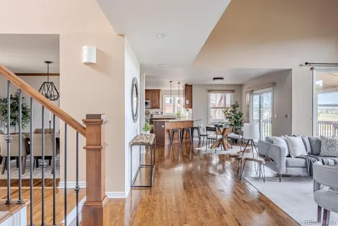 a view of a living room and dining room